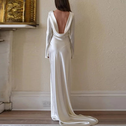 "Back view emphasizing hollow out design of White Satin Mermaid Dress"
