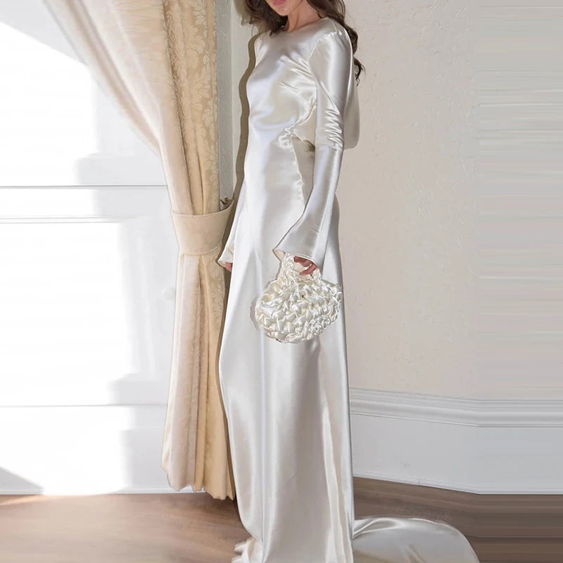 "Side view showcasing long sleeves and hollow out design of White Satin Mermaid Dress"
