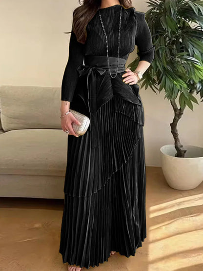 Full-length view of the Women’s Floor-Length A-Line Pleated Dress in black, showcasing its chic style.
