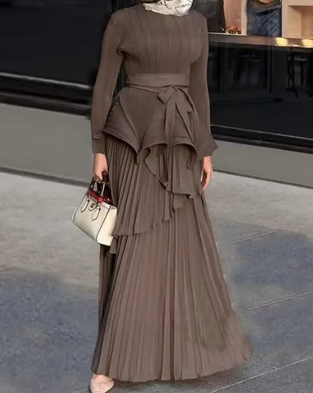 Back view of the Women’s Floor-Length A-Line Pleated Dress in brown, highlighting its flowy design.
