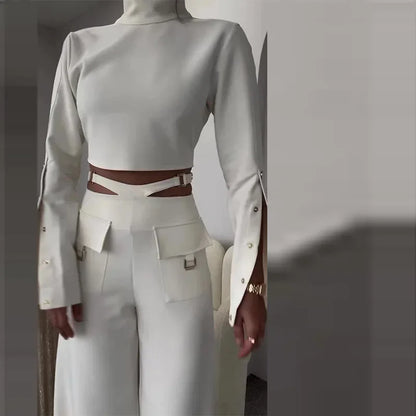 Casual white matching set with turtleneck top and pants.