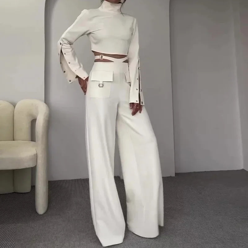 "White two-piece set with turtleneck top and wide-leg pants