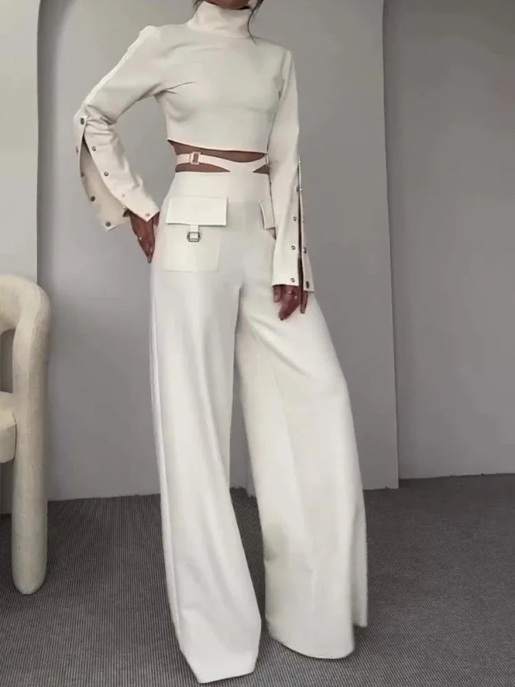 "Women’s white pant set with a turtleneck and loose fit